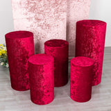 Elevate Your Event Decor with Red Crushed Velvet Cylinder Pillar Prop Covers